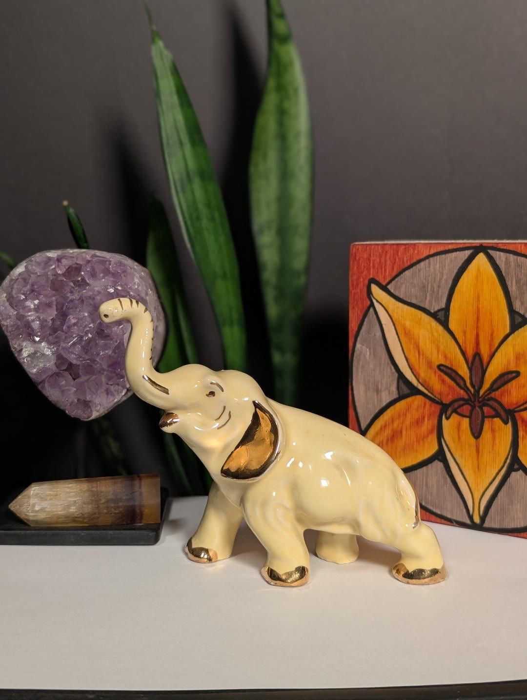 CER177 yellow elephant figurine