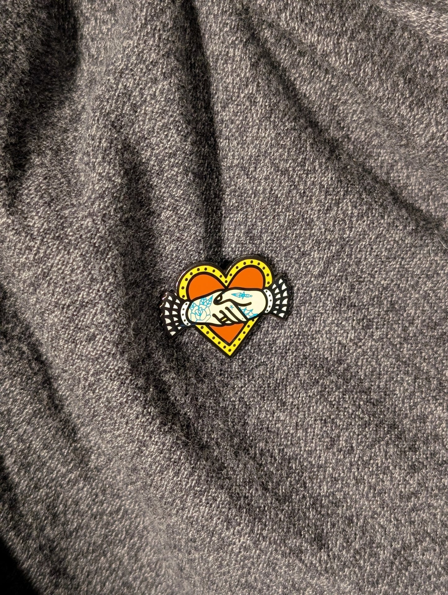 Hand shake pin