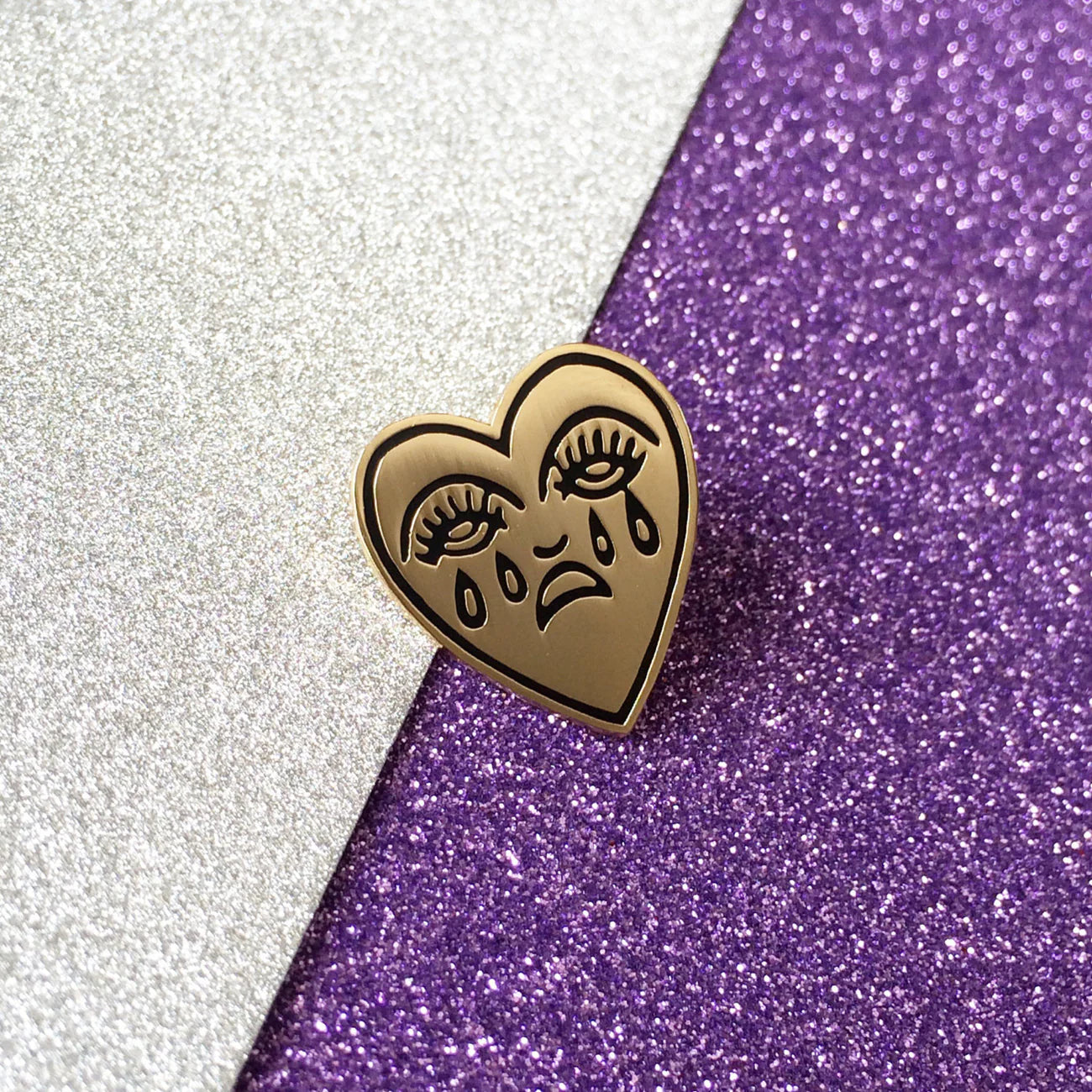 Crying heart pin
