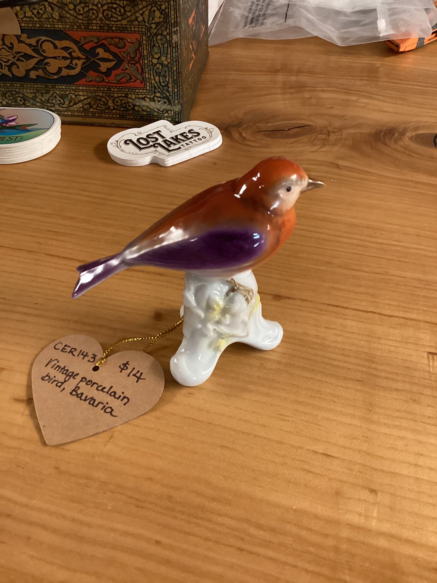 CER143 porcelain orange and purple bird on branch, Bavaria