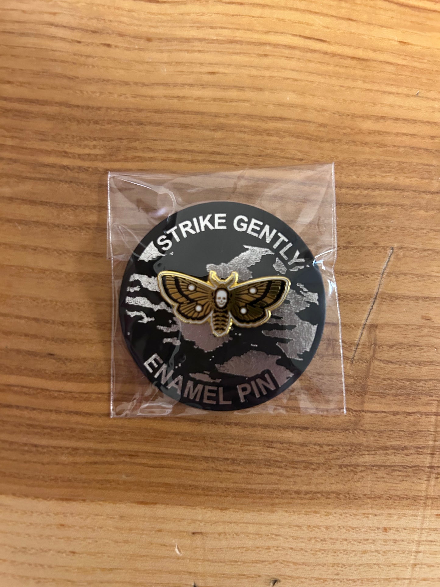 Black and gold dead head moth pin