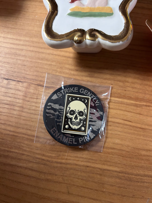 Human skull pin