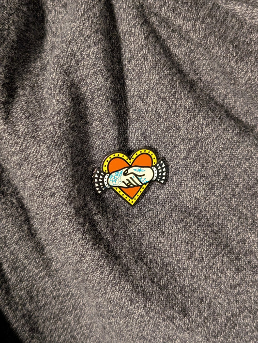 Hand shake pin