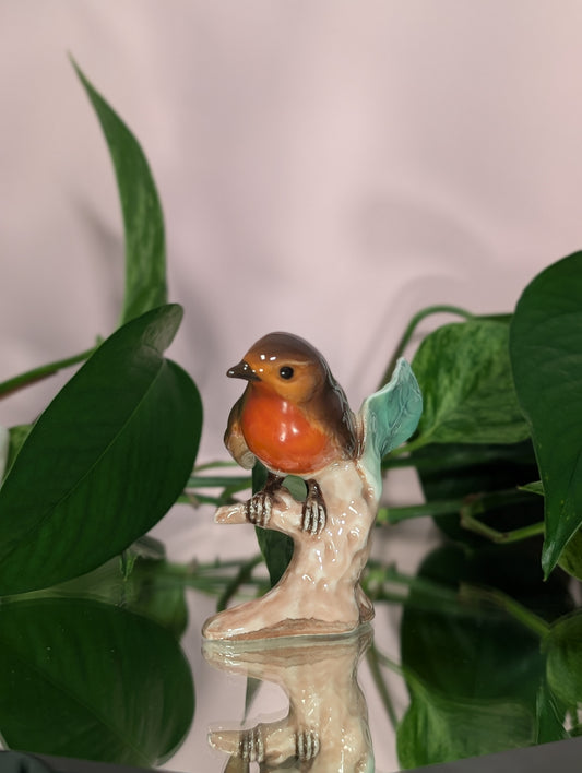 Bird on a branch figurine