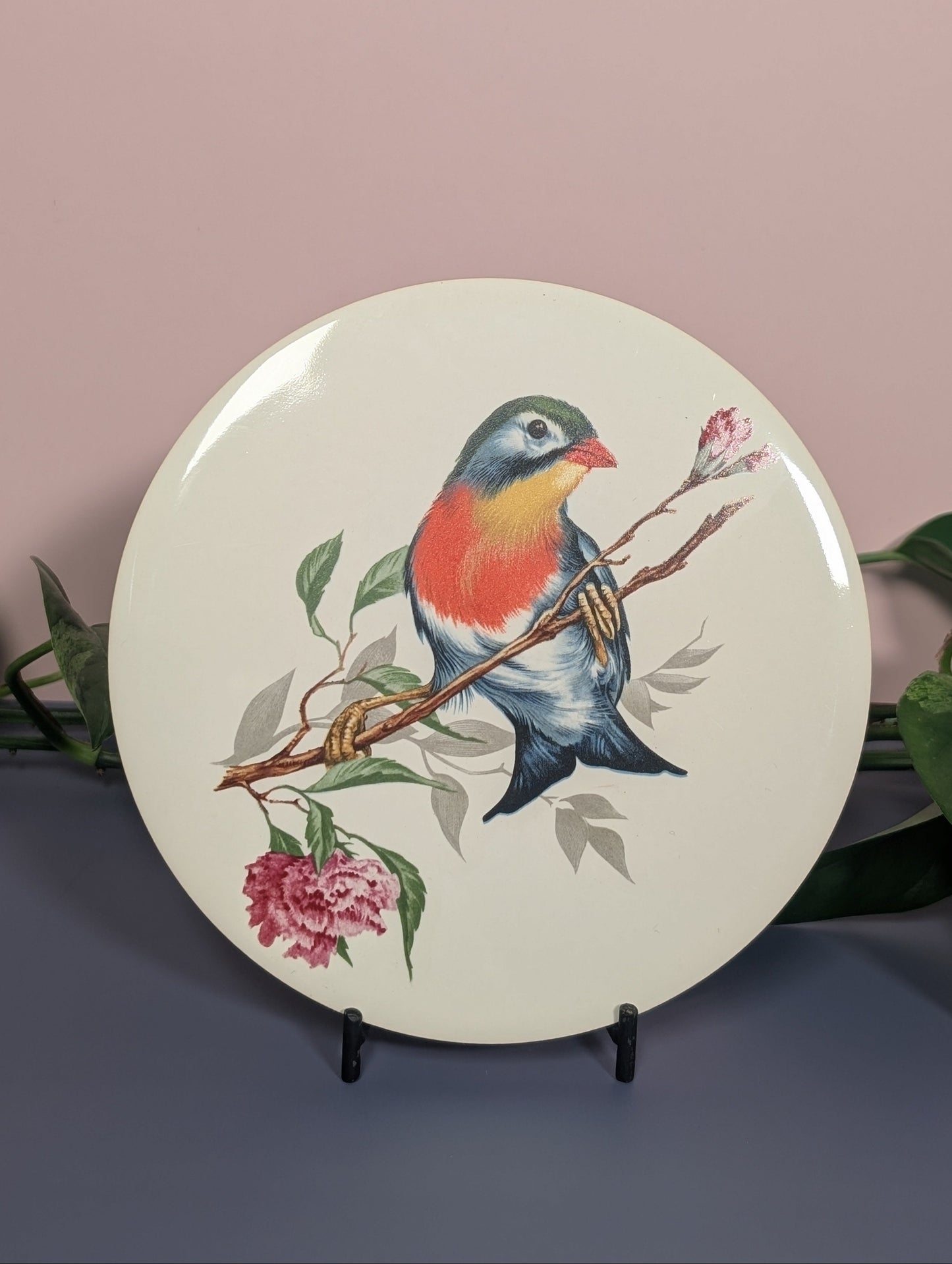 Bird trivet with carnations